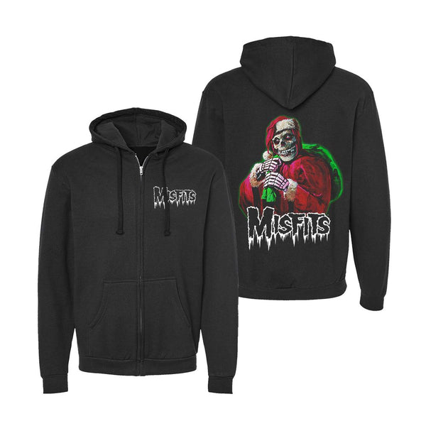 Black zip hoodie with Misfits skull design on back, part of Misfits Holiday Fiend collection