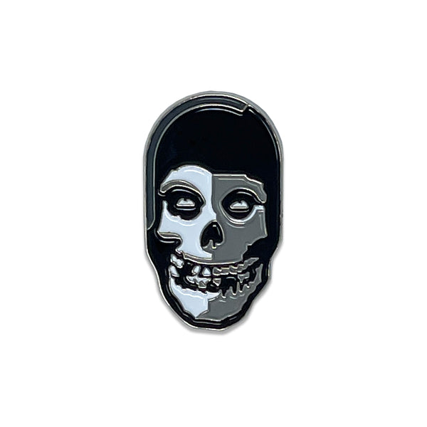 Metallic Misfits Fiend Skull badge with a shiny silver and black finish by Tom Whalen