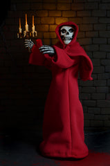 Skeletal Misfits Fiend clothed action figure in a red hooded robe with candelabra