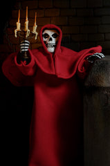 Skeletal Misfits Fiend clothed action figure in a red hooded robe holding a candelabra