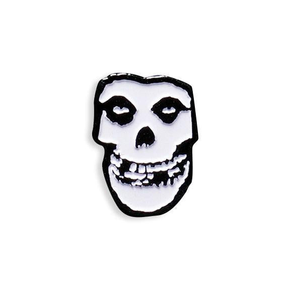 Stylized Misfits Fiend Skull Enamel Pin featuring a skull face with prominent teeth